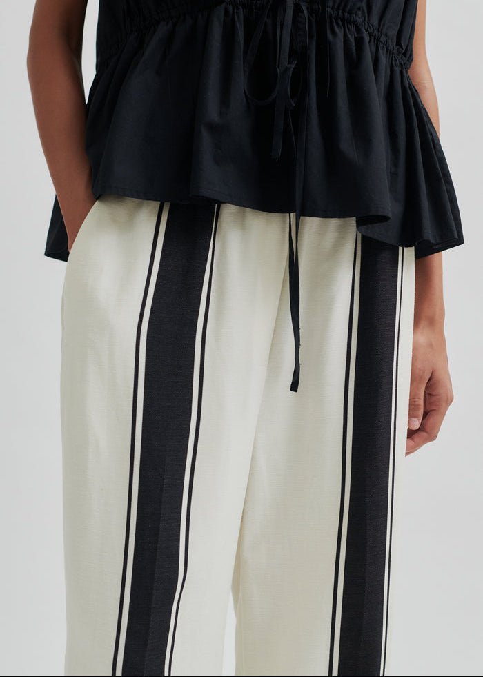 Lie Trousers in White from SECOND FEMALE at Edito boutique