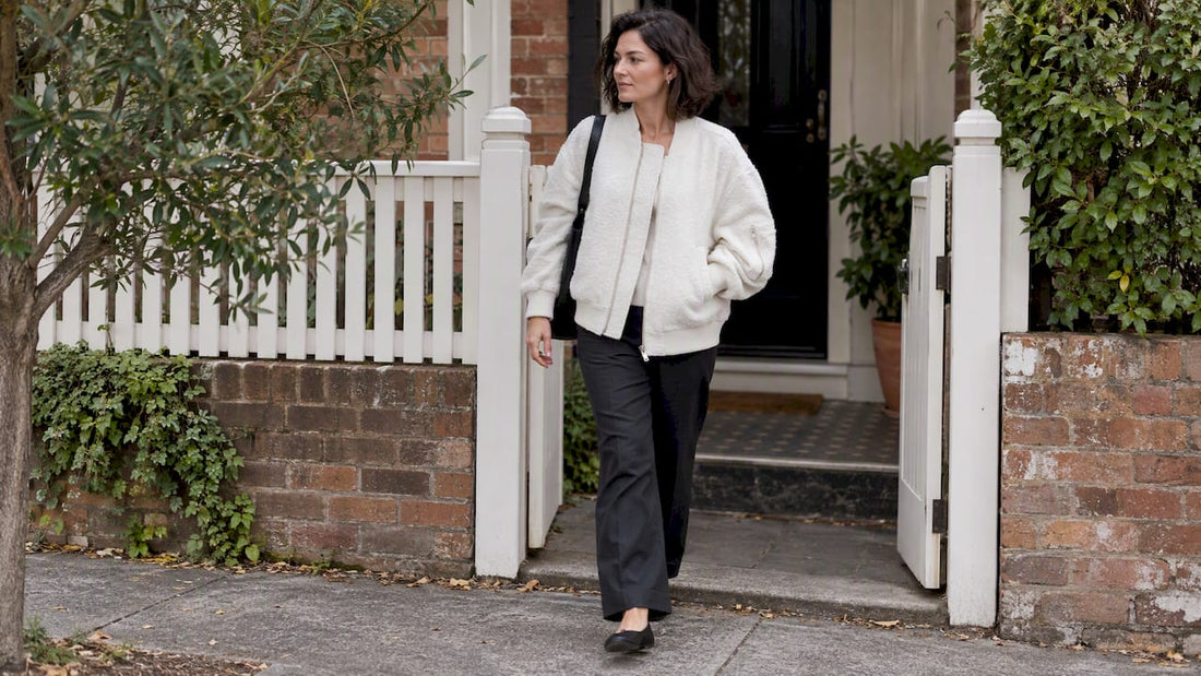 Woman wearing a textured bomber on Brisbane street