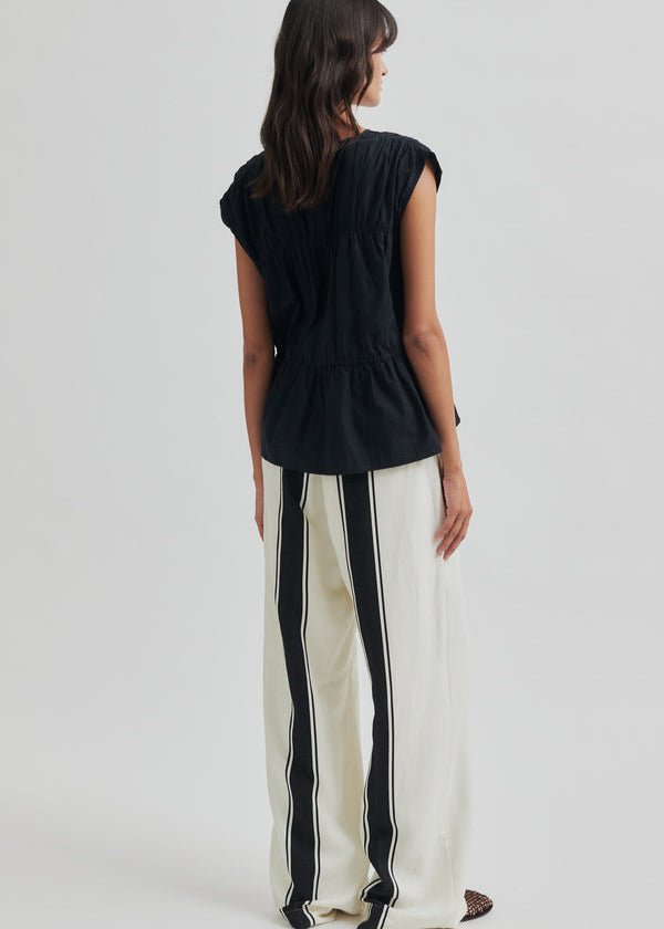 Lie Trousers in White from SECOND FEMALE at Edito boutique