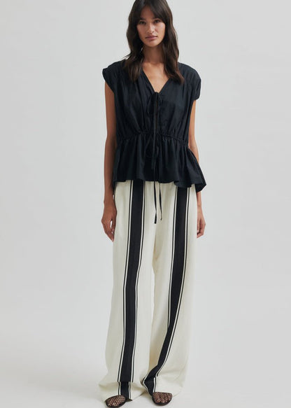 Lie Trousers in White from SECOND FEMALE at Edito boutique