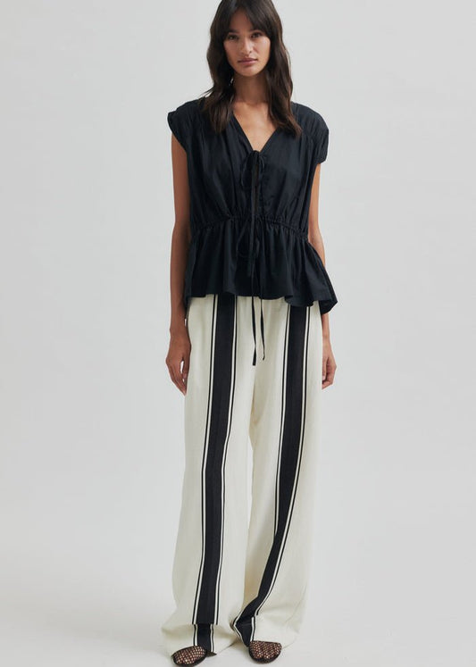 Lie Trousers in White from SECOND FEMALE at Edito boutique